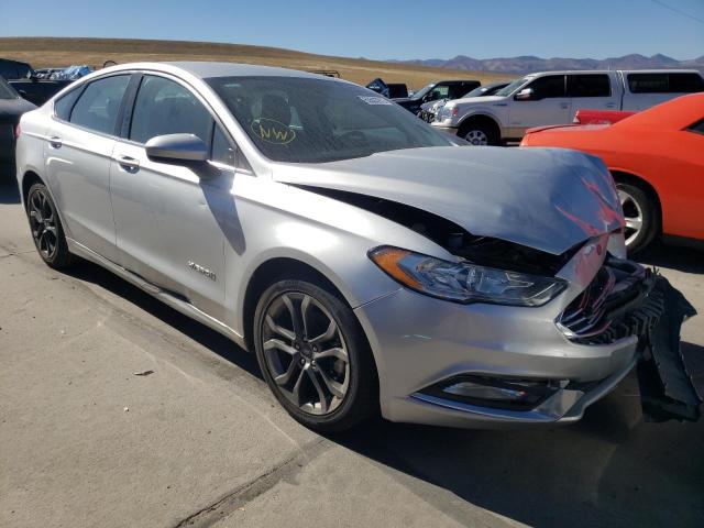 FORD FUSION SE 2018 with VIN 3FA6P0LU0JR102992 - Photo from auction