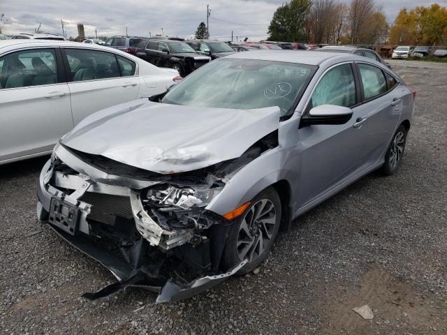 Photo 2 from auction – 2018 HONDA CIVIC LX with VIN 2HGFC2F62JH009306