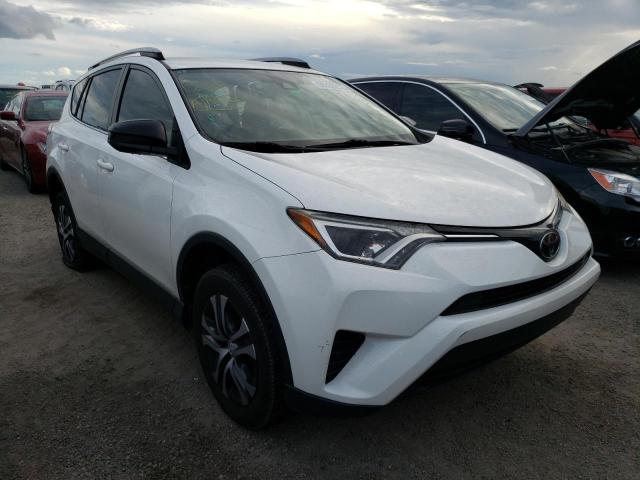 TOYOTA RAV4 LE 2017 with VIN JTMZFREV2HJ130883 - Photo from auction