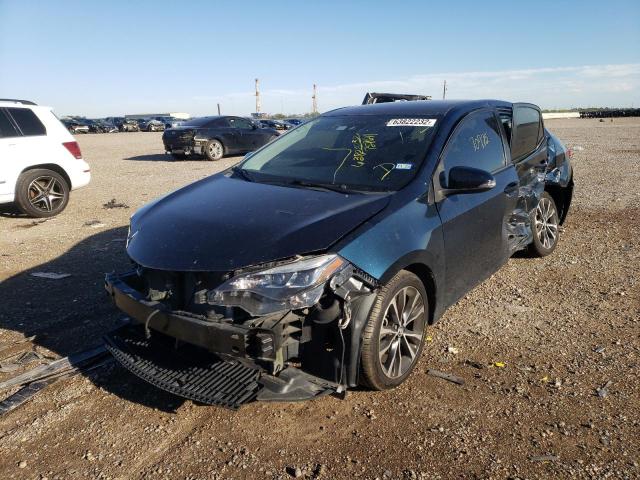 Photo 2 from auction – 2018 TOYOTA COROLLA L with VIN 5YFBURHE0JP758641