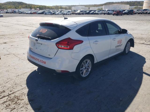 Photo 4 from auction – 2014 FORD FOCUS SE with VIN 1FADP3F25EL145232