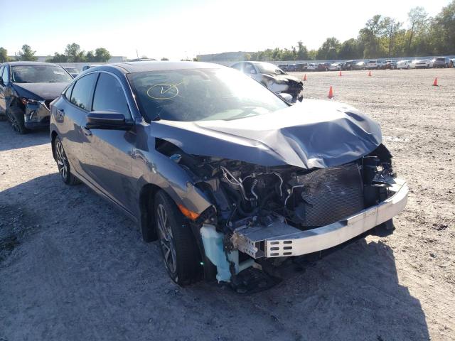 HONDA CIVIC EX 2018 with VIN 2HGFC2F78JH565984 - Photo from auction