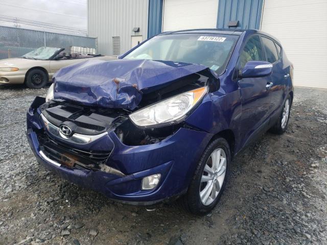 Photo 2 from auction – 2011 HYUNDAI TUCSON GLS with VIN KM8JUCAC4BU255101