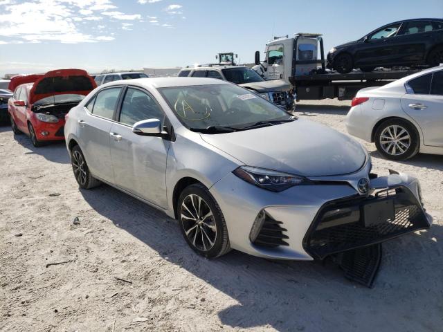 TOYOTA COROLLA L 2019 with VIN 5YFBURHE8KP902986 - Photo from auction