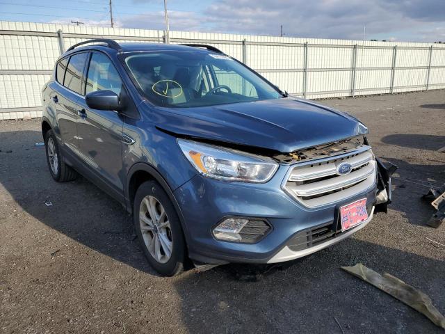 FORD ESCAPE SE 2018 with VIN 1FMCU9GD0JUA93171 - Photo from auction