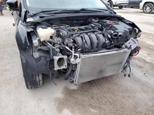 Photo 9 from auction – 2013 FORD FOCUS SE with VIN 1FADP3F26DL231387