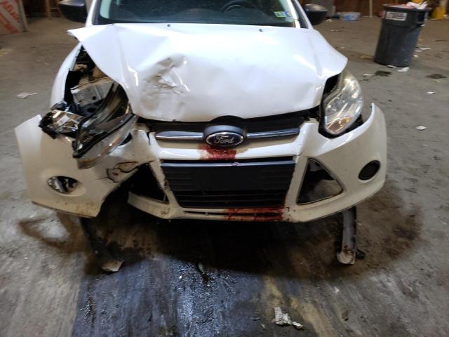 Photo 9 from auction – 2014 FORD FOCUS S with VIN 1FADP3E22EL242938