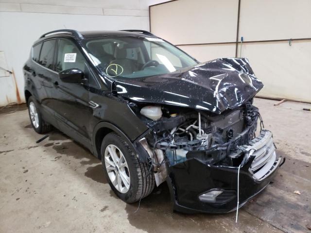 FORD ESCAPE SE 2018 with VIN 1FMCU0GD8JUC04593 - Photo from auction