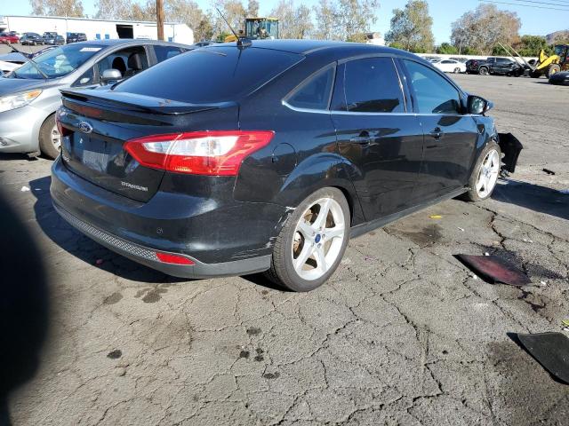 Photo 4 from auction – 2014 FORD FOCUS TITA with VIN 1FADP3J23EL254635