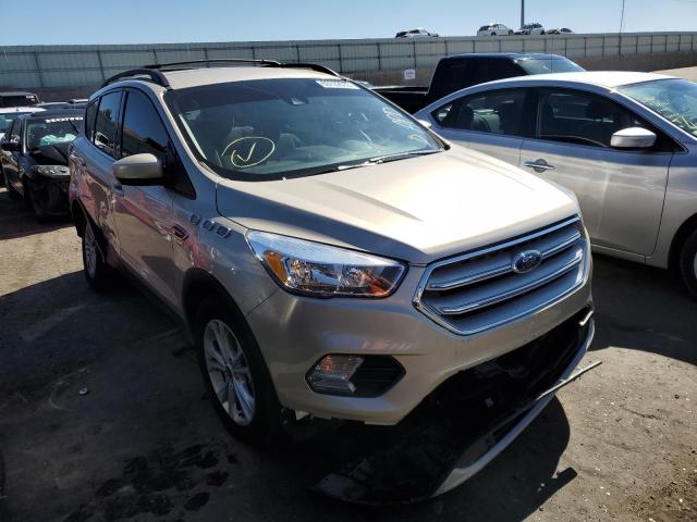 FORD ESCAPE SE 2018 with VIN 1FMCU9GD5JUC35207 - Photo from auction