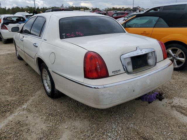 Photo 3 from auction – 2002 LINCOLN TOWN CAR E with VIN 1LNHM81W82Y637677