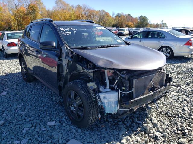 TOYOTA RAV4 LE 2014 with VIN JTMBFREV4EJ006949 - Photo from auction