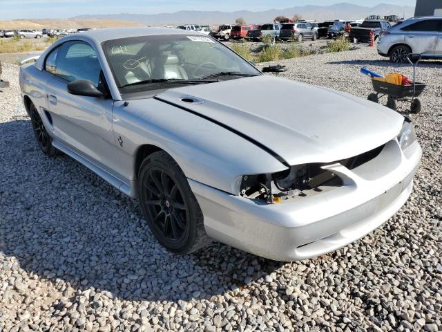 FORD MUSTANG 1998 with VIN 1FAFP4049WF243110 - Photo from auction