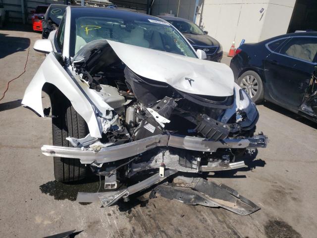 Photo 9 from auction – 2022 TESLA MODEL 3 with VIN 5YJ3E1EB8NF253865