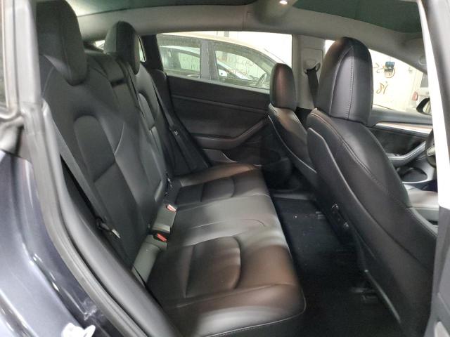 Photo 6 from auction – 2022 TESLA MODEL 3 with VIN 5YJ3E1EB7NF107618