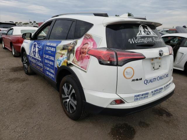 Photo 3 from auction – 2018 TOYOTA RAV4 LE with VIN JTMZFREV7JJ196643