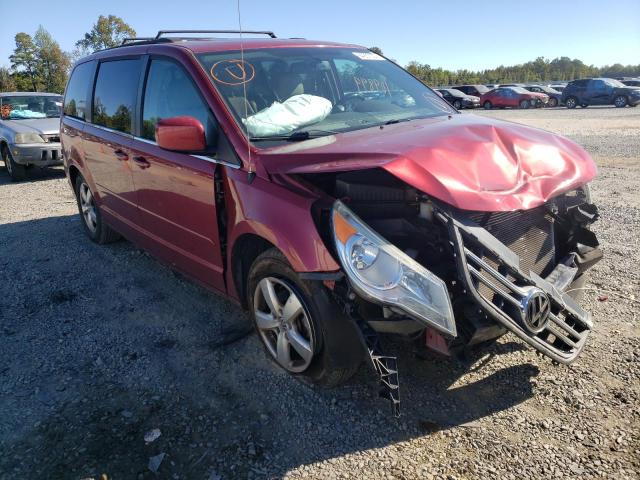 VOLKSWAGEN ROUTAN 2011 with VIN 2V4RW5DG1BR691094 - Photo from auction