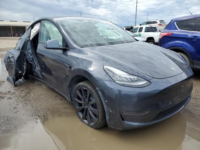 TESLA MODEL Y 2021 with VIN 5YJYGDEE6MF071057 - Photo from auction