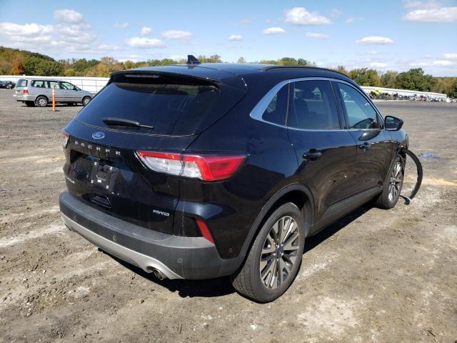 Photo 4 from auction – 2021 FORD ESCAPE TIT with VIN 1FMCU9J91MUA57028