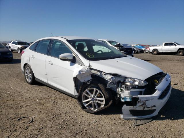 FORD FOCUS SE 2016 with VIN 1FADP3F23GL391974 - Photo from auction