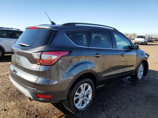 Photo 3 from auction – 2018 FORD ESCAPE SE with VIN 1FMCU9GD0JUB58052