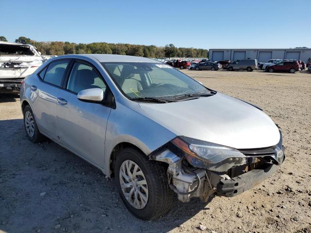 TOYOTA COROLLA L 2017 with VIN 5YFBURHE8HP571268 - Photo from auction