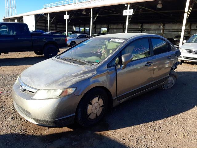Photo 2 from auction – 2006 HONDA CIVIC HYBR with VIN JHMFA36276S010179