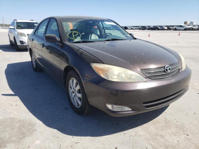 TOYOTA CAMRY LE 2003 with VIN 4T1BE32K73U661429 - Photo from auction