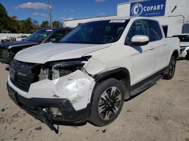Photo 2 from auction – 2020 HONDA RIDGELINE with VIN 5FPYK3F52LB021057