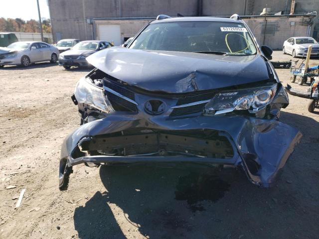 Photo 9 from auction – 2014 TOYOTA RAV4 LE with VIN JTMZFREV6ED042736