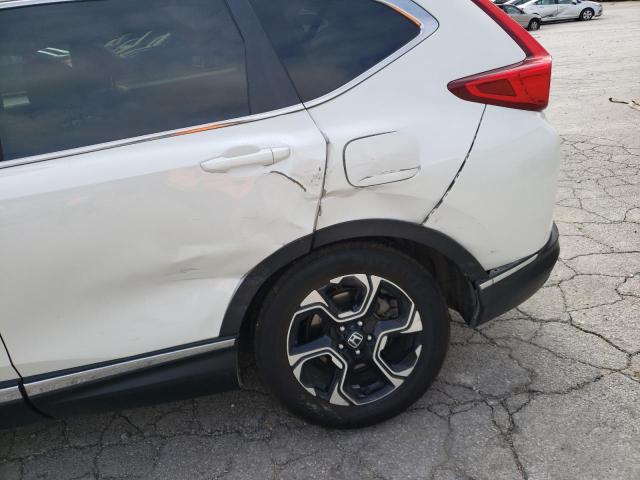 Photo 9 from auction – 2017 HONDA CRV with VIN 5J6RW2H97HL005575