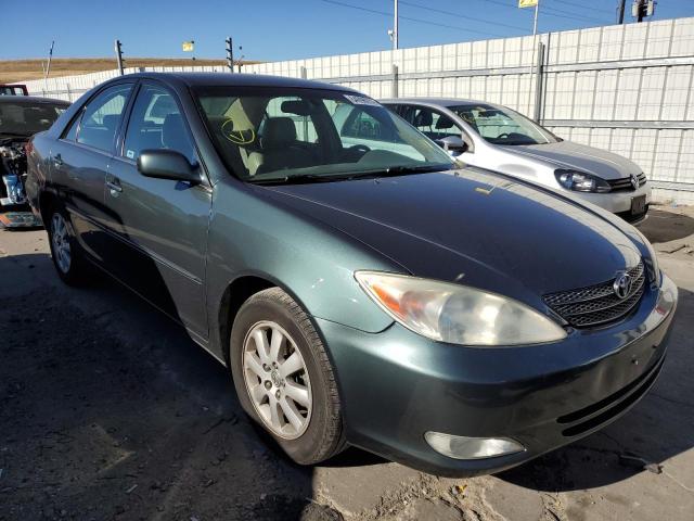 TOYOTA CAMRY LE 2003 with VIN 4T1BE30K03U784539 - Photo from auction