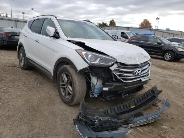 HYUNDAI SANTA FE S 2018 with VIN 5NMZU3LB6JH084319 - Photo from auction