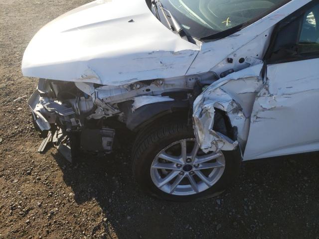 Photo 9 from auction – 2018 FORD FOCUS SE with VIN 1FADP3F27JL250655