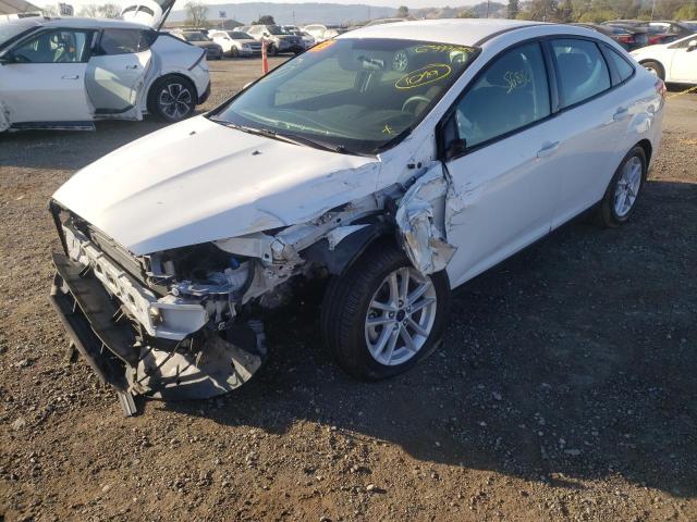 Photo 2 from auction – 2018 FORD FOCUS SE with VIN 1FADP3F27JL250655