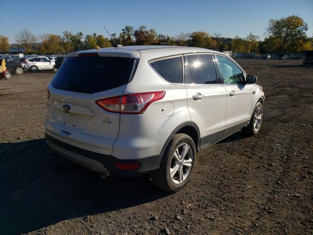 Photo 4 from auction – 2014 FORD ESCAPE SE with VIN 1FMCU9G98EUD34198