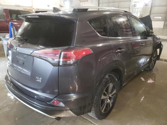Photo 4 from auction – 2016 TOYOTA RAV4 XLE with VIN JTMRFREV4GJ097948