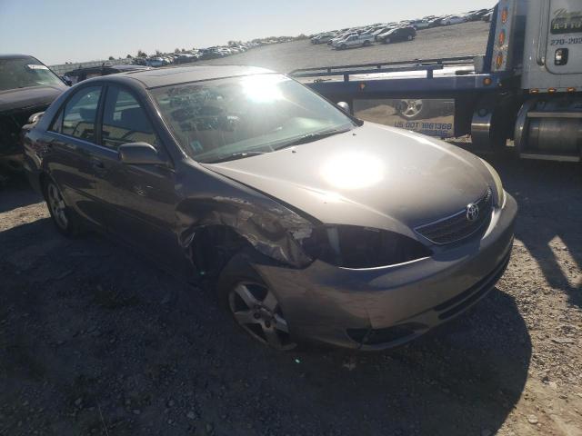 TOYOTA CAMRY LE 2002 with VIN 4T1BE32KX2U557984 - Photo from auction