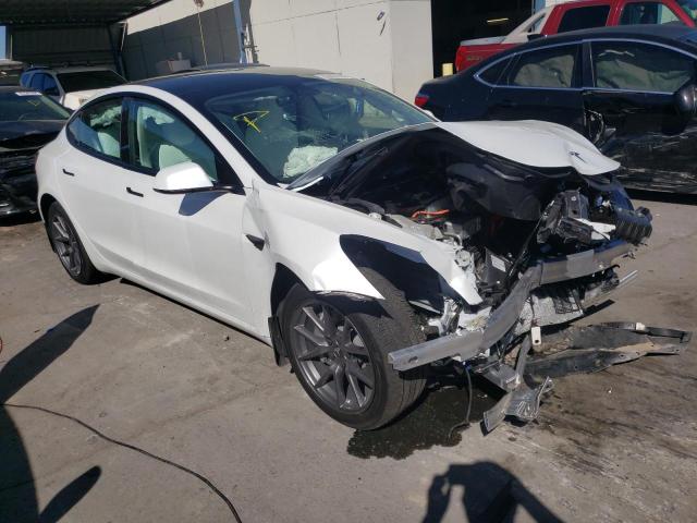 TESLA MODEL 3 2022 with VIN 5YJ3E1EB8NF253865 - Photo from auction
