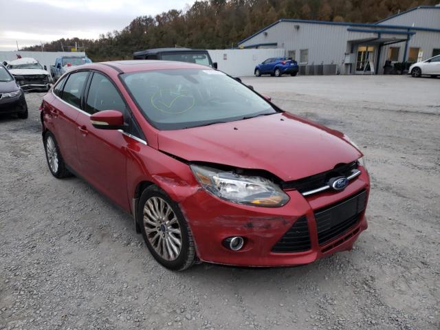 FORD FOCUS TITA 2012 with VIN 1FAHP3J24CL310869 - Photo from auction