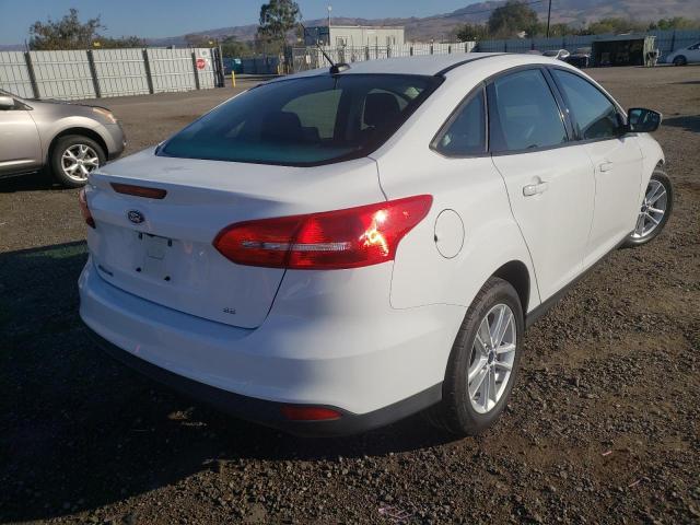 Photo 4 from auction – 2018 FORD FOCUS SE with VIN 1FADP3F27JL250655