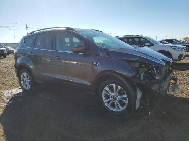 Photo 4 from auction – 2018 FORD ESCAPE SE with VIN 1FMCU9GD0JUB58052