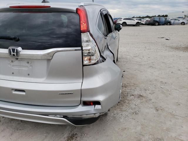 Photo 9 from auction – 2015 HONDA CR-V TOURI with VIN 5J6RM3H94FL014968