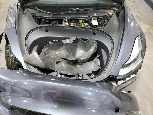 Photo 7 from auction – 2022 TESLA MODEL 3 with VIN 5YJ3E1EB7NF107618