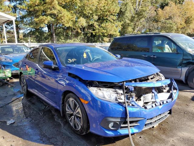 HONDA CIVIC EX 2017 with VIN 2HGFC1F34HH649592 - Photo from auction