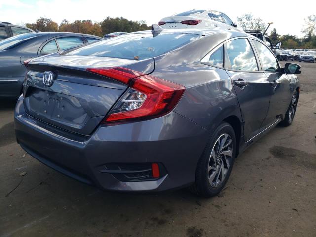 Photo 4 from auction – 2018 HONDA CIVIC EX with VIN 2HGFC2F75JH515852