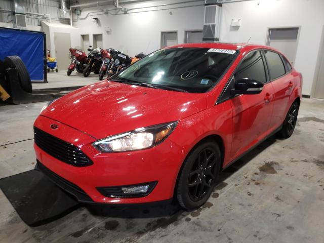 Photo 2 from auction – 2016 FORD FOCUS SE with VIN 1FADP3F24GL353105