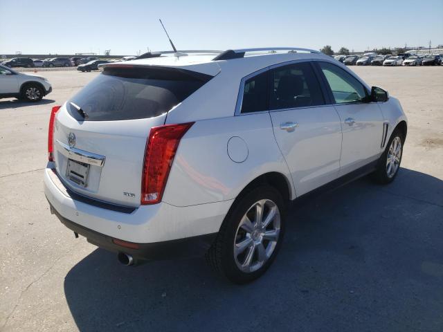 Photo 4 from auction – 2013 CADILLAC SRX PERFOR with VIN 3GYFNDE36DS601055