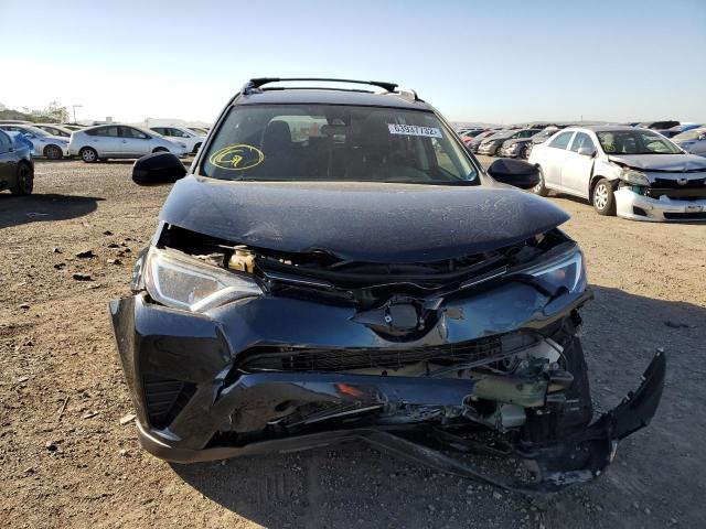 Photo 9 from auction – 2017 TOYOTA RAV4 LE with VIN JTMZFREV0HJ113774