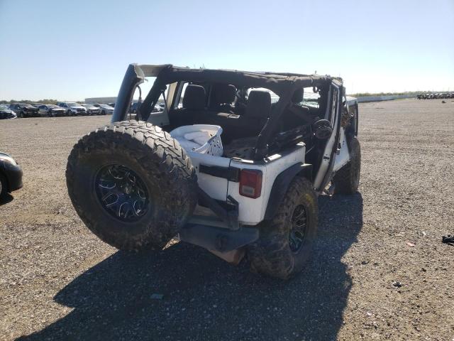 Photo 4 from auction – 2012 JEEP WRANGLER U with VIN 1C4BJWDG2CL179080